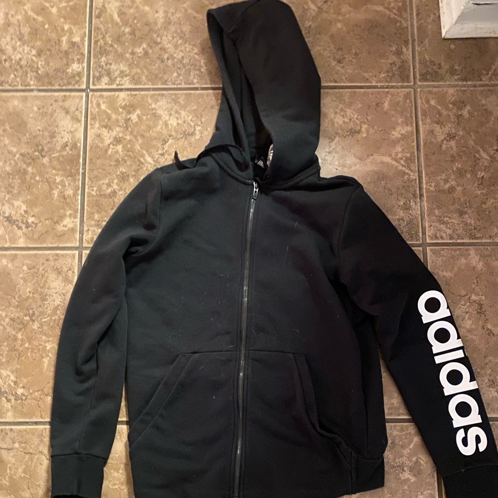 adidas black zip up, adidas logo on the side arm